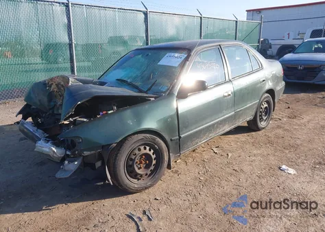 2001 Toyota Corolla Le z USA, uszkodzony, nr VIN 2T1BR12E31C458278